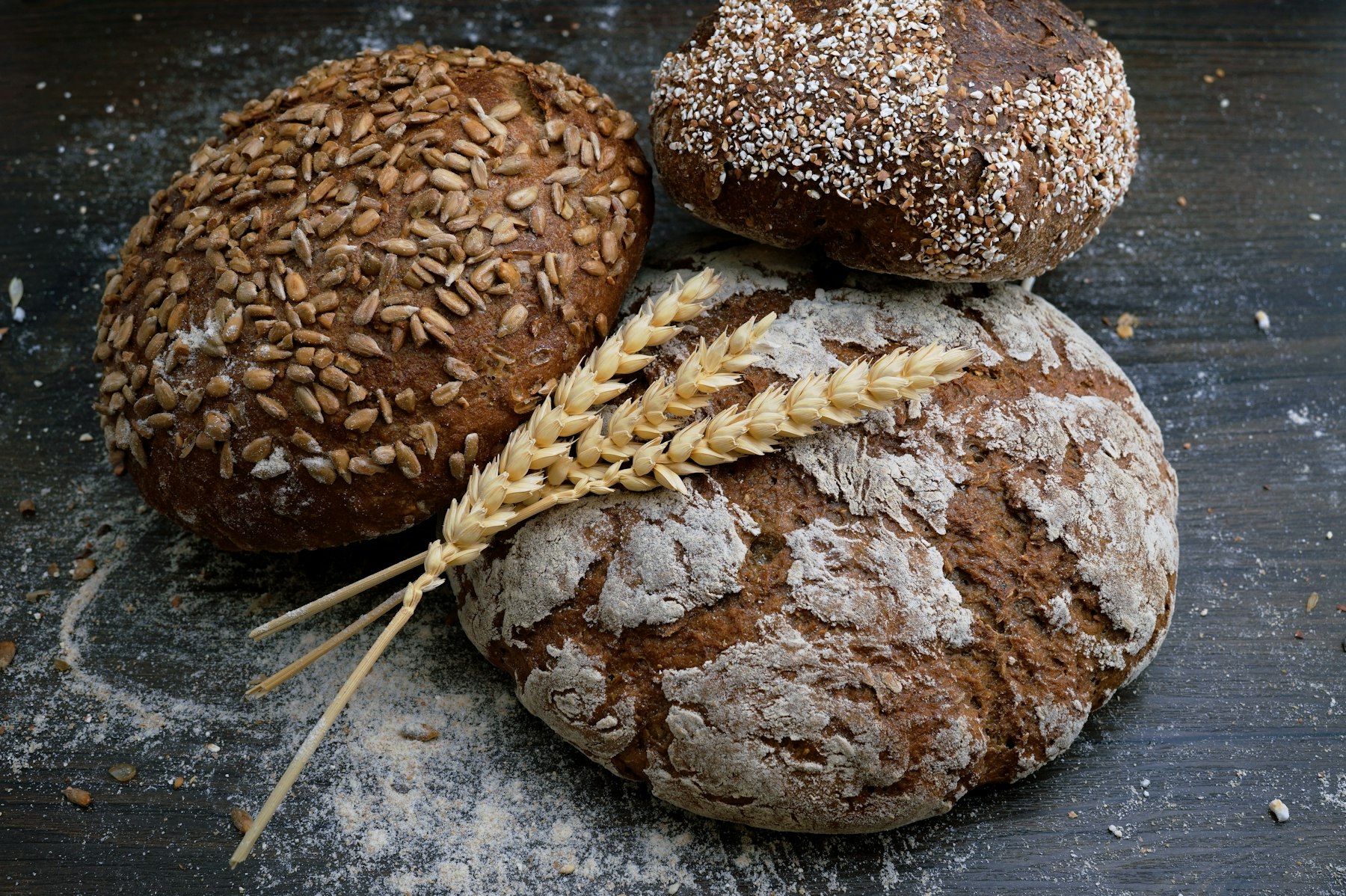Loaves of the kitchen on dark wood